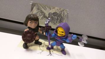 Wun-Dar Loyal Subjects Custom (Masters of the Universe) Custom Action Figure [Action Shot Wun-Dar Fighting Hot Topic Skeletor]